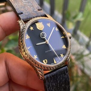 6 Gucci G-Timeless Automatic 126.4 18k Gold Au750