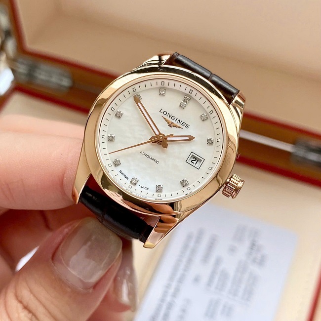 2 Longines Conquest mat MOP coc kim vang khoi 18k L2.285.8 2 Longines Conquest mat MOP coc kim vang khoi 18k L2.285.8
