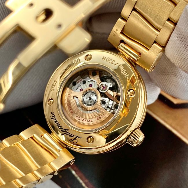 Omega De Ville 425.65.34.20.51.001 Ladymatic mặt số đen cọc hạt vàng khối 18k 34mm 5 Omega De Ville 425.65.34.20.51.001 Ladymatic mặt số đen cọc hạt vàng khối 18k 34mm 5
