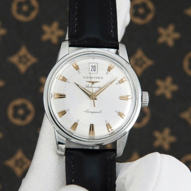 Longines Conquest Heritage Automatic mề đay vàng đúc 18k L1.611.4.75.4 35mm 1