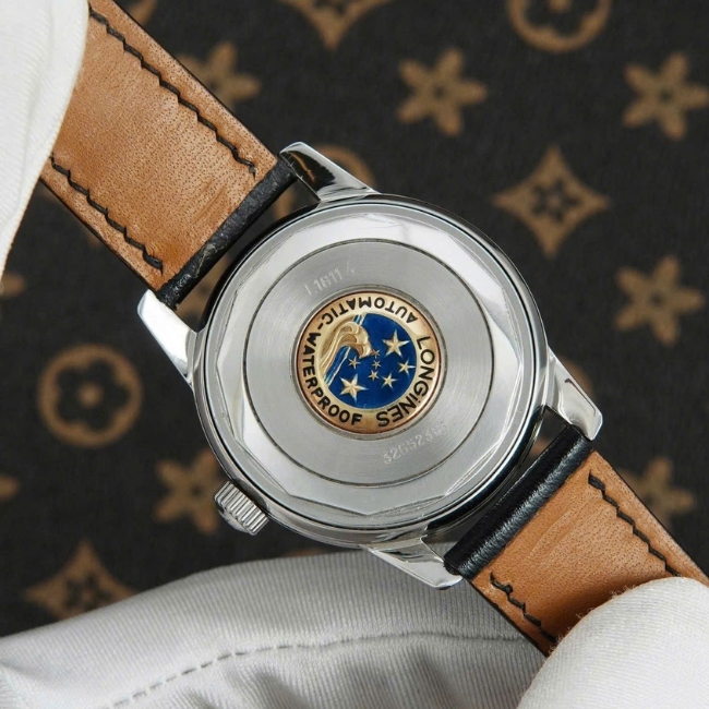 Longines Conquest Heritage Automatic mề đay vàng đúc 18k L1.611.4.75.4 35mm 4