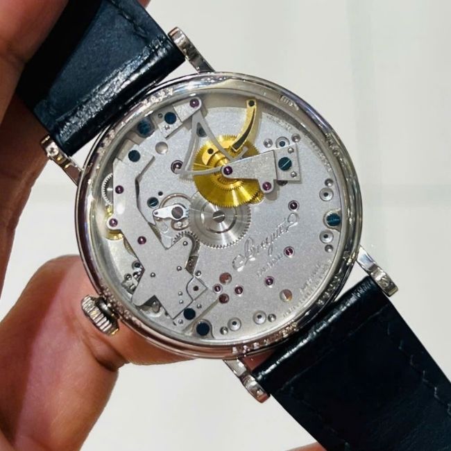 Breguet Tradition Skeleton bản cót tay - Vàng trắng đúc 18k 37mm 7027bb_11_9v6 5 Breguet Tradition Skeleton bản cót tay - Vàng trắng đúc 18k 37mm 7027bb_11_9v6 5