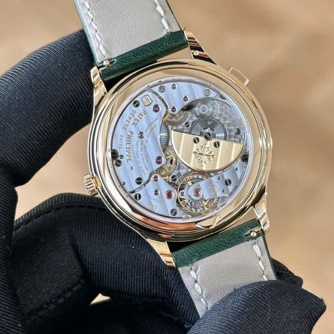 Patek Philippe World Time 7130R Dial xanh lá 8 Patek Philippe World Time 7130R Dial xanh lá 8